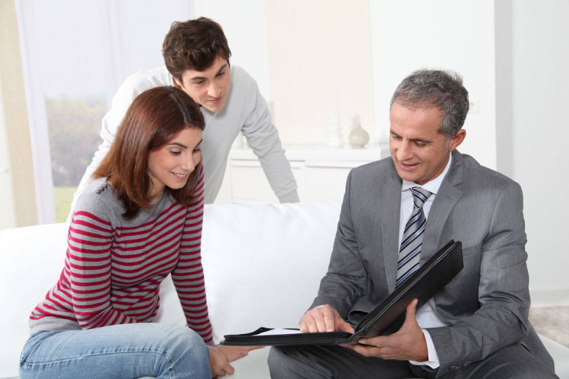 Young couple working with a financial advisor