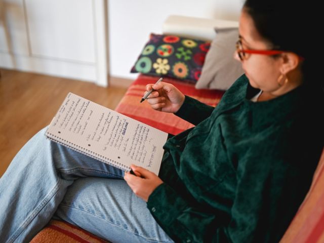 A woman writing notes