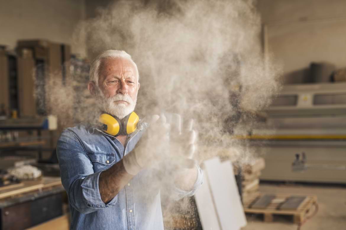 Man in a wood shop Man in a woodshop