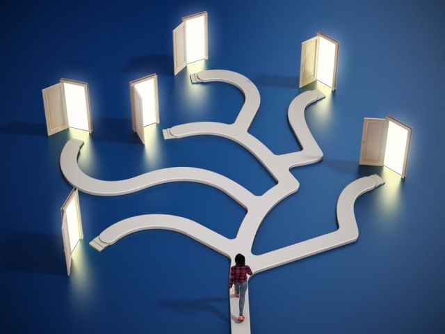A graphic showing a person walking along a path with multiple open doors.