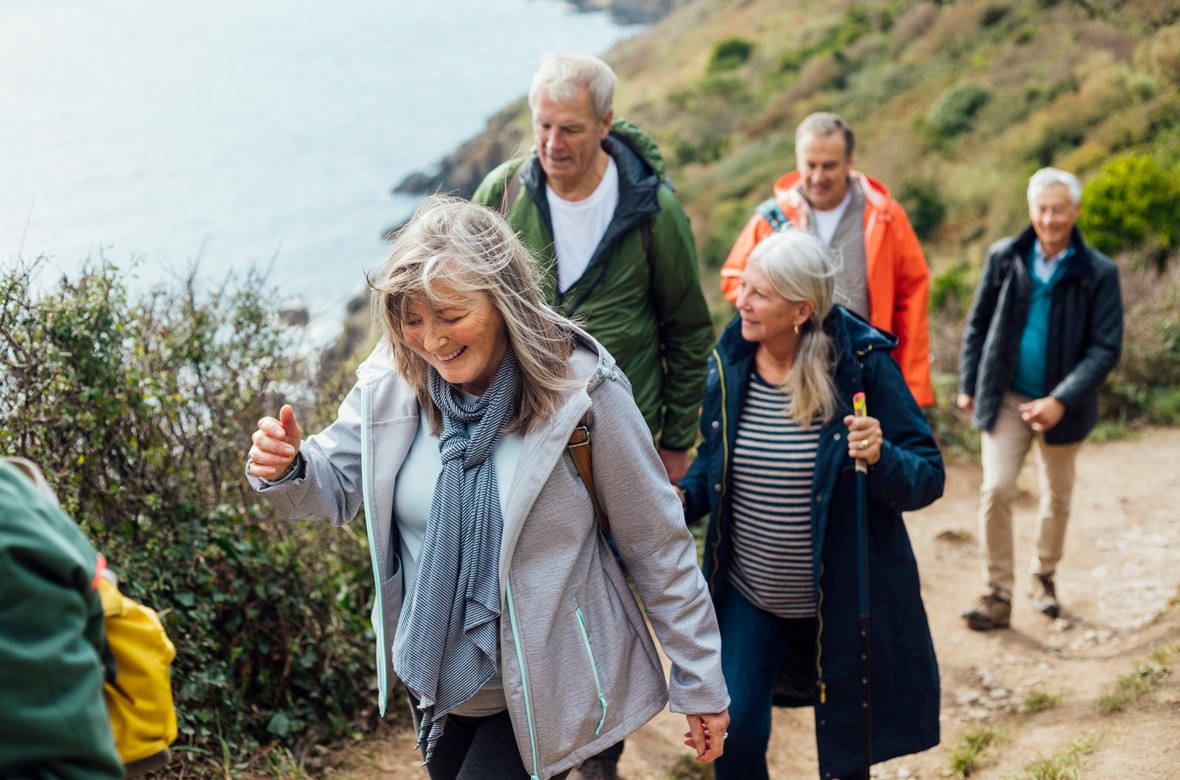 People Hiking Down a Trail