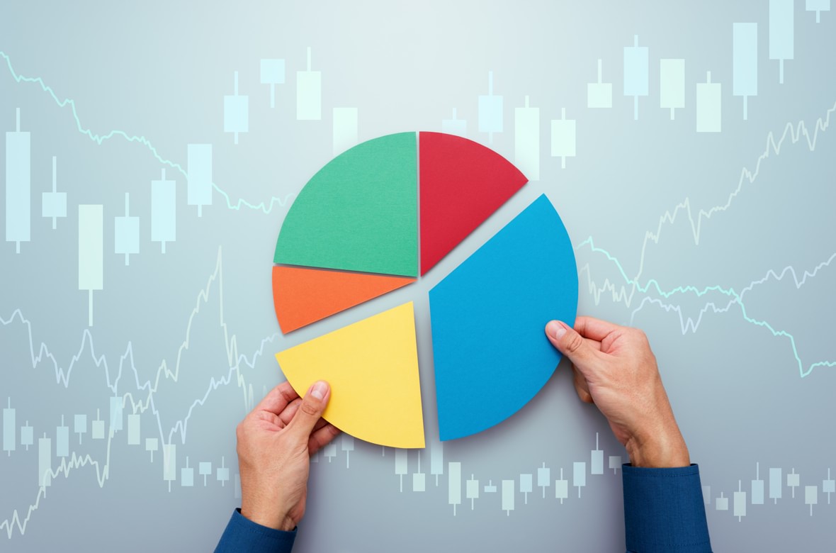 A man holding a pie chart A man holding a pie chart