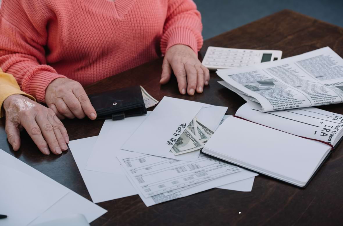 A couple comparing a ROTH IRA and a Traditional IRA A couple comparing a ROTH IRA and a Traditional IRA